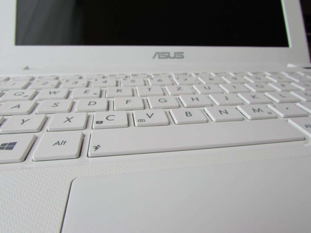 Asus ROG Zephyrus g14 keyboard in white color.